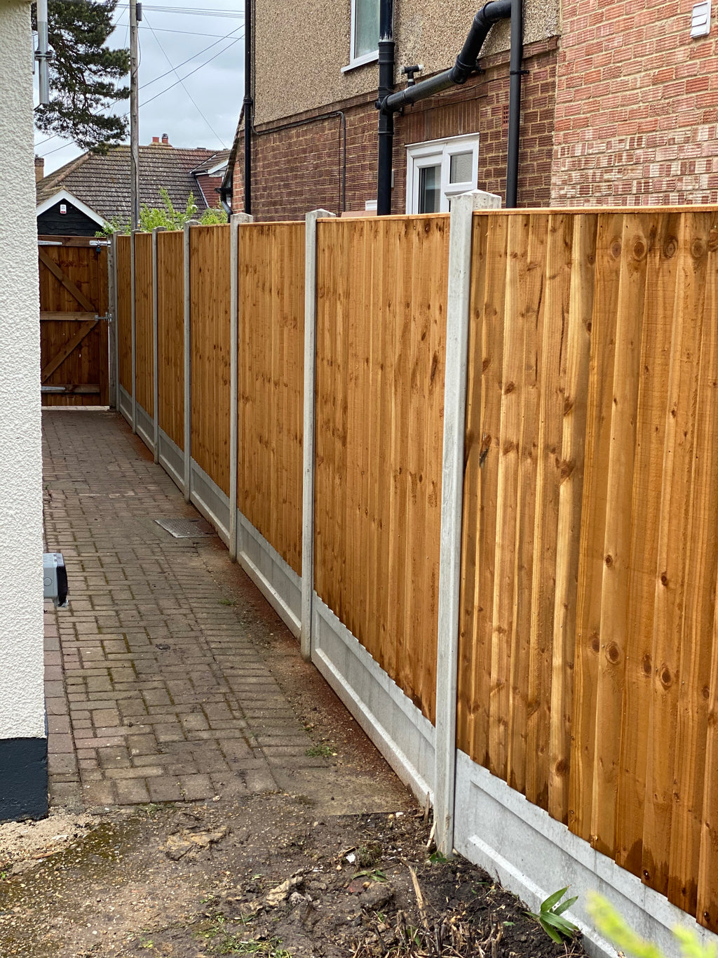Professionally installed closeboard fencing with concrete posts and gravel boards by Romford Fencing Ltd