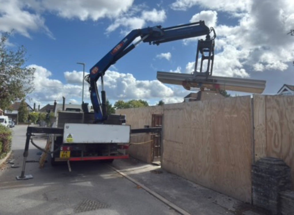 hiab fencing delivery by Romford fencing Ltd Essex Kent and London 